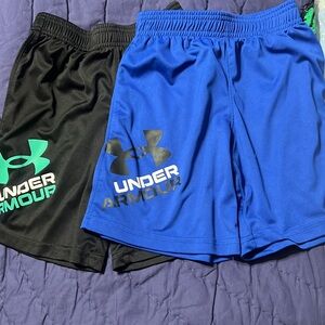Under Armour boys size 7 black shorts and blue shorts